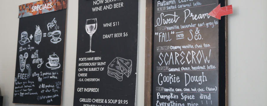 chalkboard signs of Shakespeare and Cos Cafe menus for fall