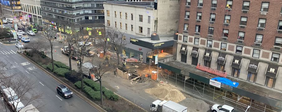 view of the street work happening on Broadway at 62nd Street  due to the water main break