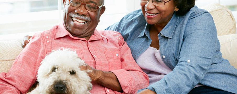 man and woman with a dog