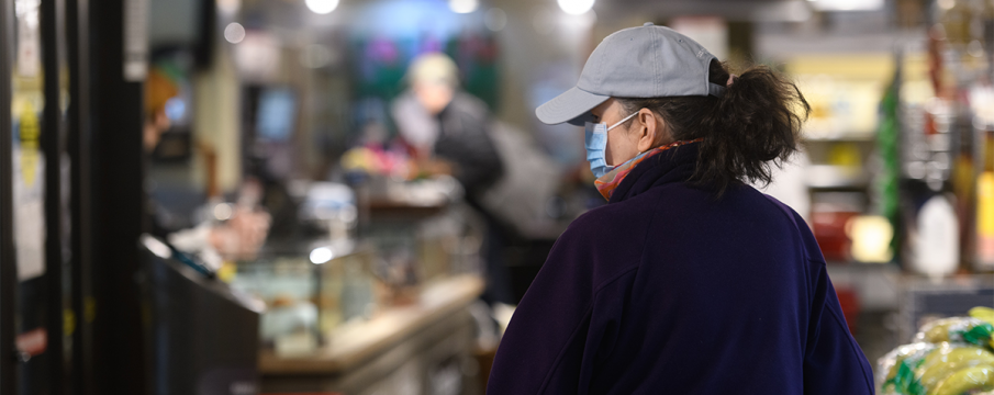 woman shopping with a face mask on