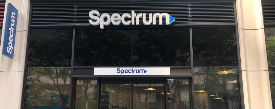 the outside of Spectrum with signage on Broadway at 61st Street