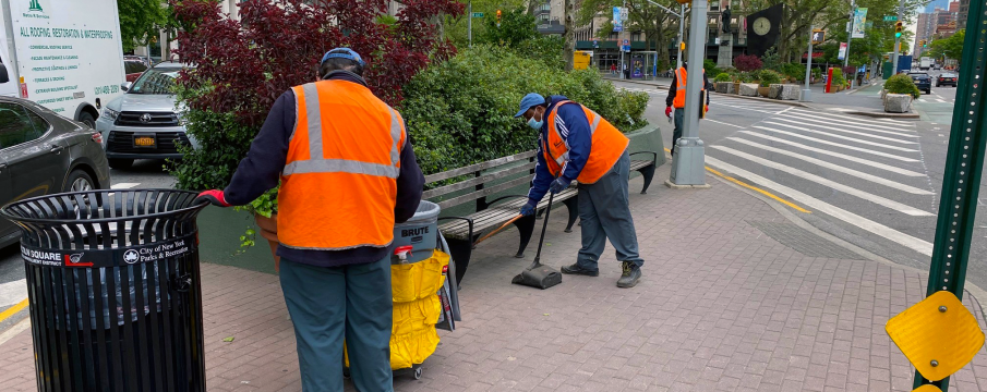 goddard green keeper sweep liter and collect trash from a Broadway Mall pedestrian landing