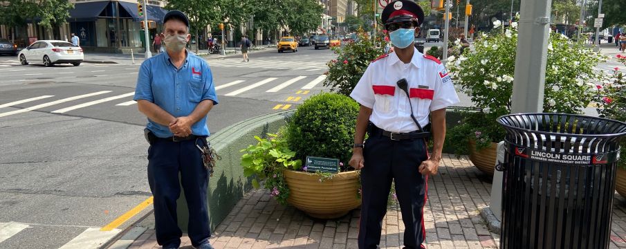 clean team supervisor tony and public safety officer lincoln standing near each other