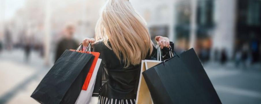 woman holding shopping bags