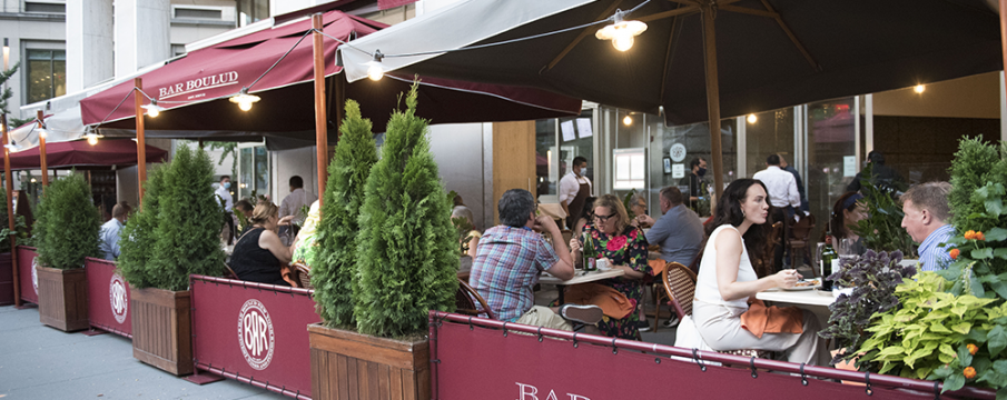 diners eating outside bar boulud