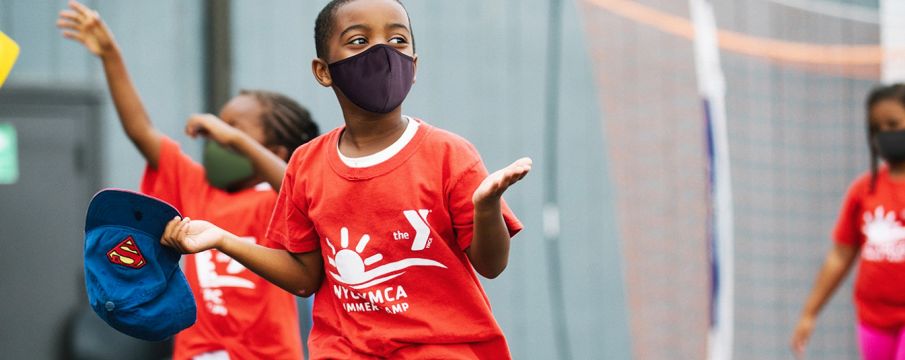 kid wearing mask at ymca camp