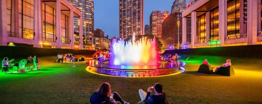 Lincoln Center's fountain lit up in rainbow lights for Pride Month