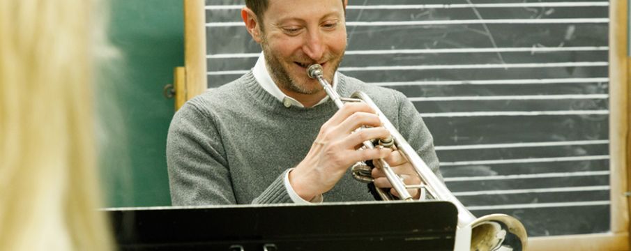 man playing trumpet