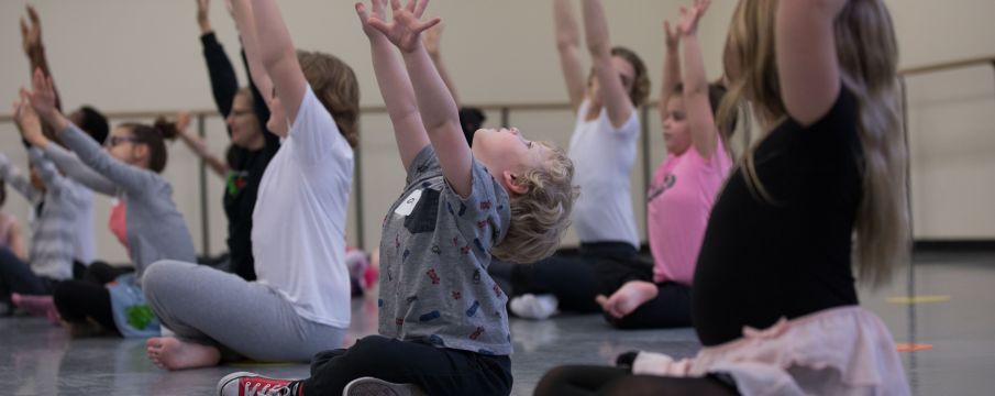 children in a performing arts class