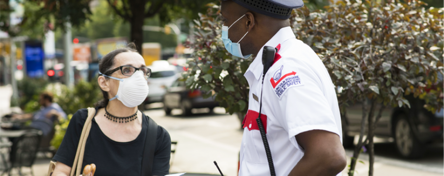 LSBID public safety officer helping a pedestrian