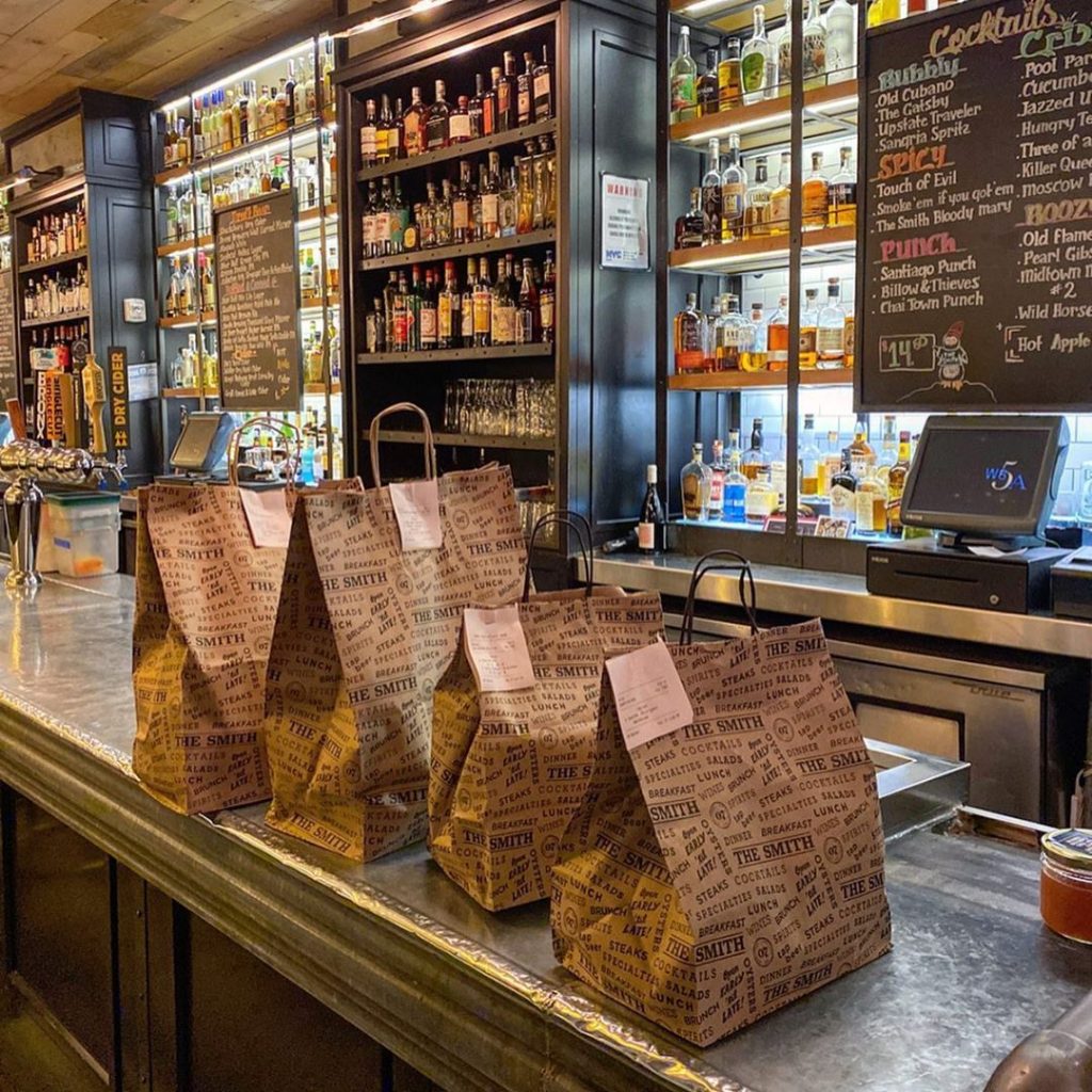 take out bags on the counter of The Smith Lincoln Square